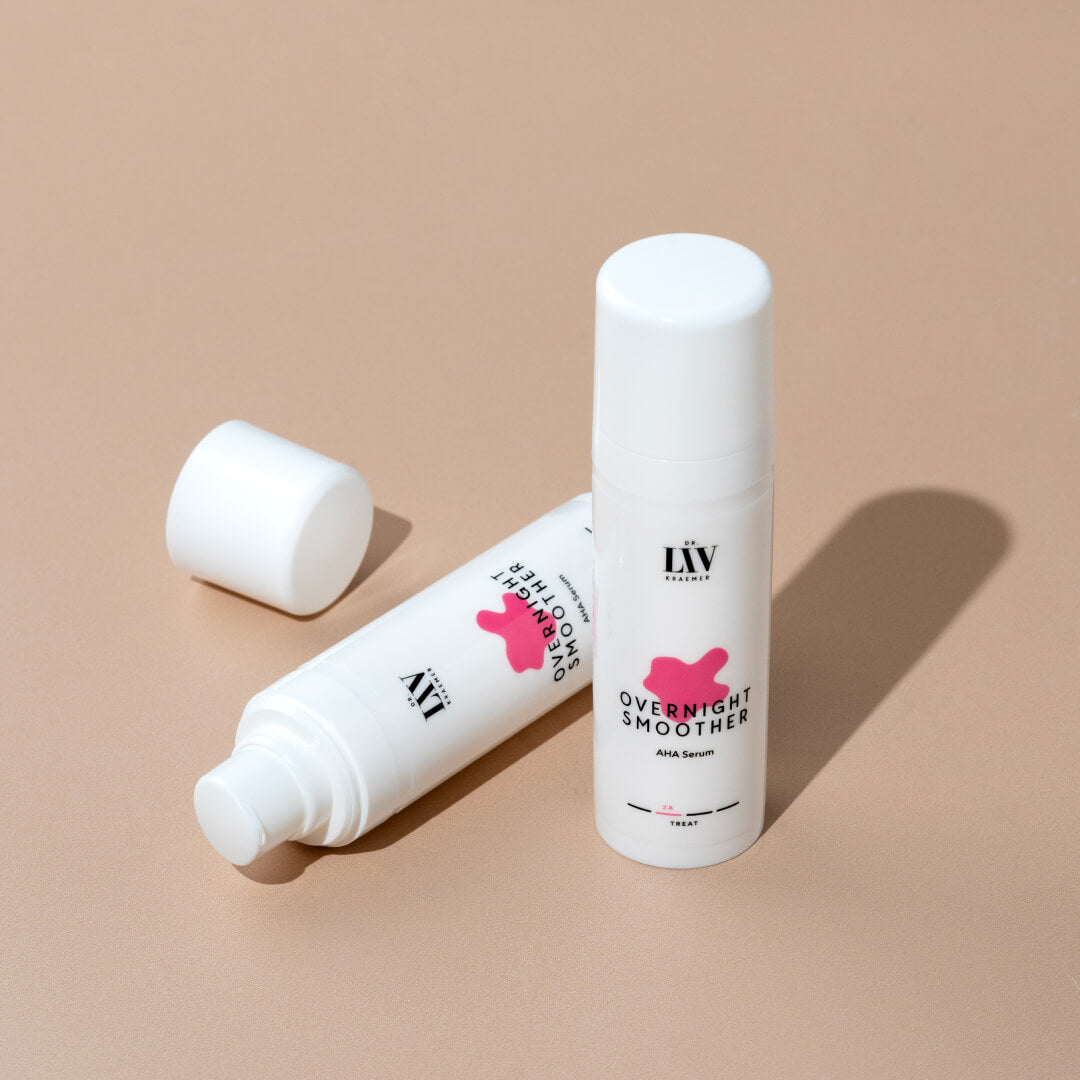 The Overnight Smoother AHA Serum developed by board certified dermatologist and skin longevity expert Dr.Liv Kraemer in front of a beige background
